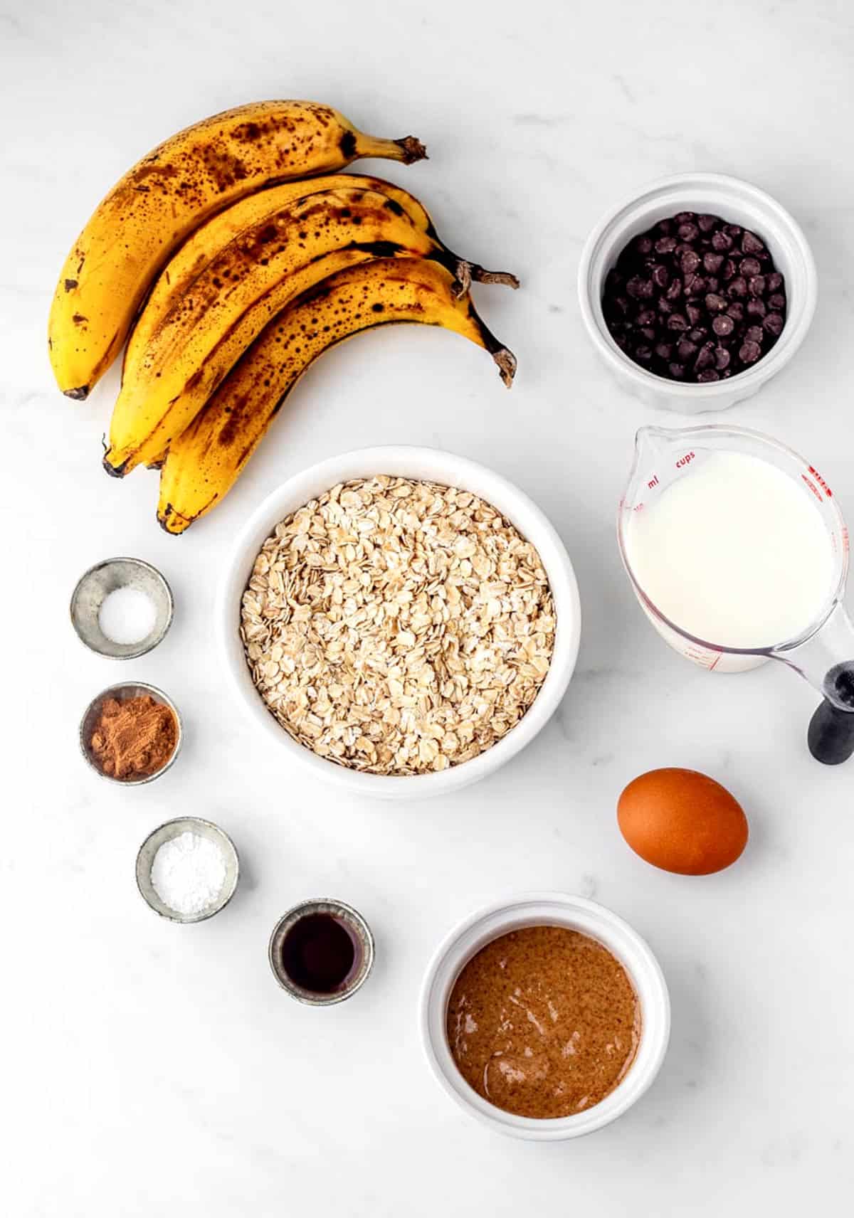 Ingredients required to make the baked chocolate chip oatmeal recipe.