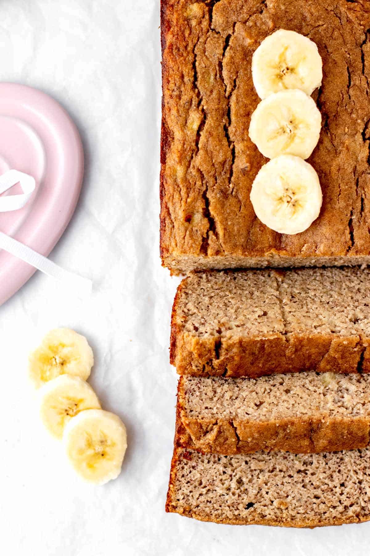 Overhead image of banana bread cut into slices.