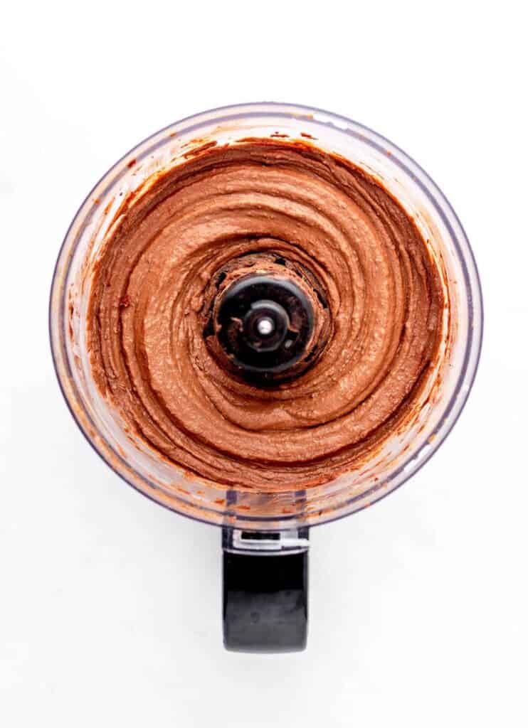 Chocolate frosting without powdered sugar in a food processor.