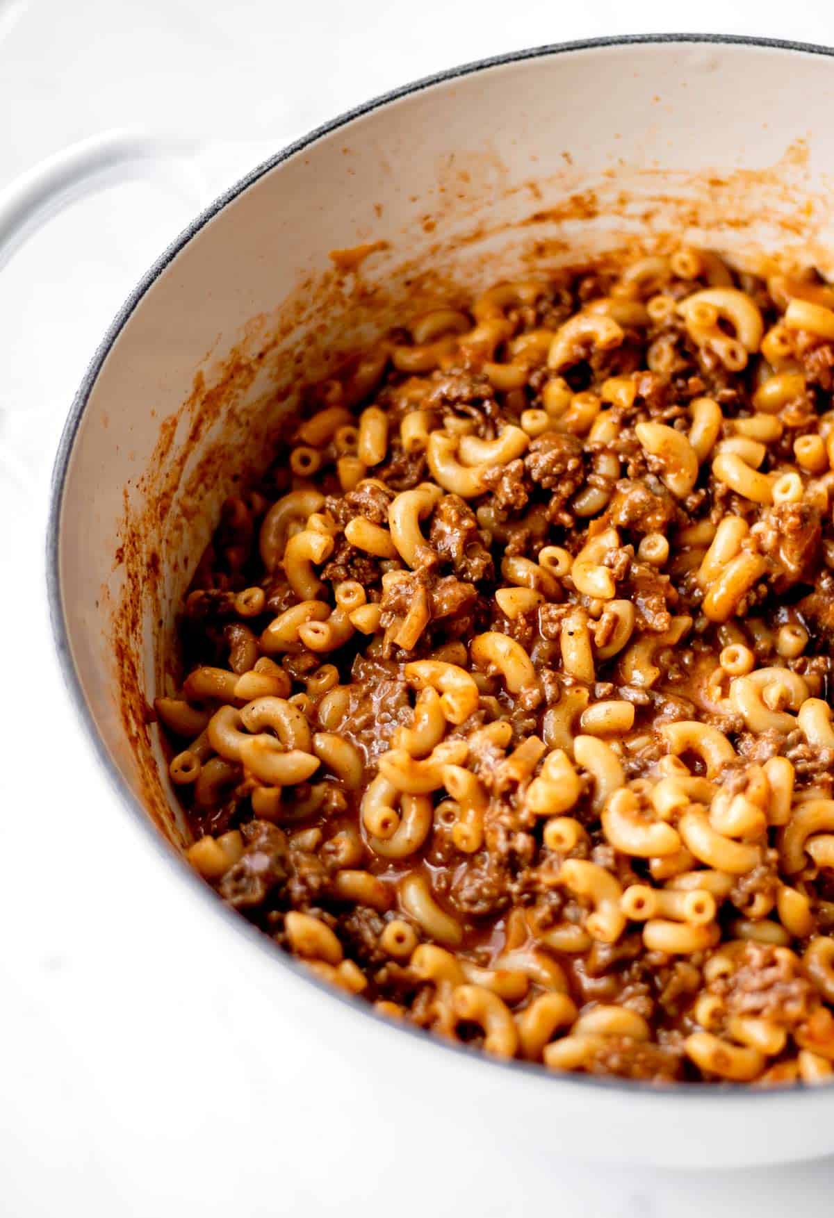 Finished homemade hamburger helper without milk in a large pot.