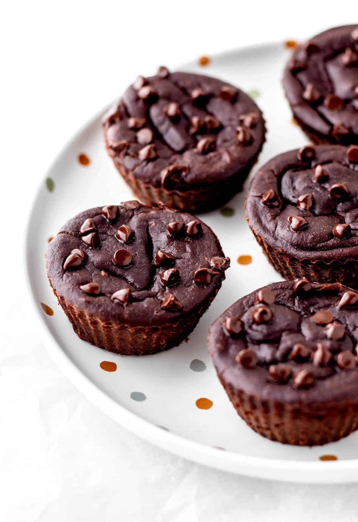 Healthy brownies with banana on a polka dot plate.