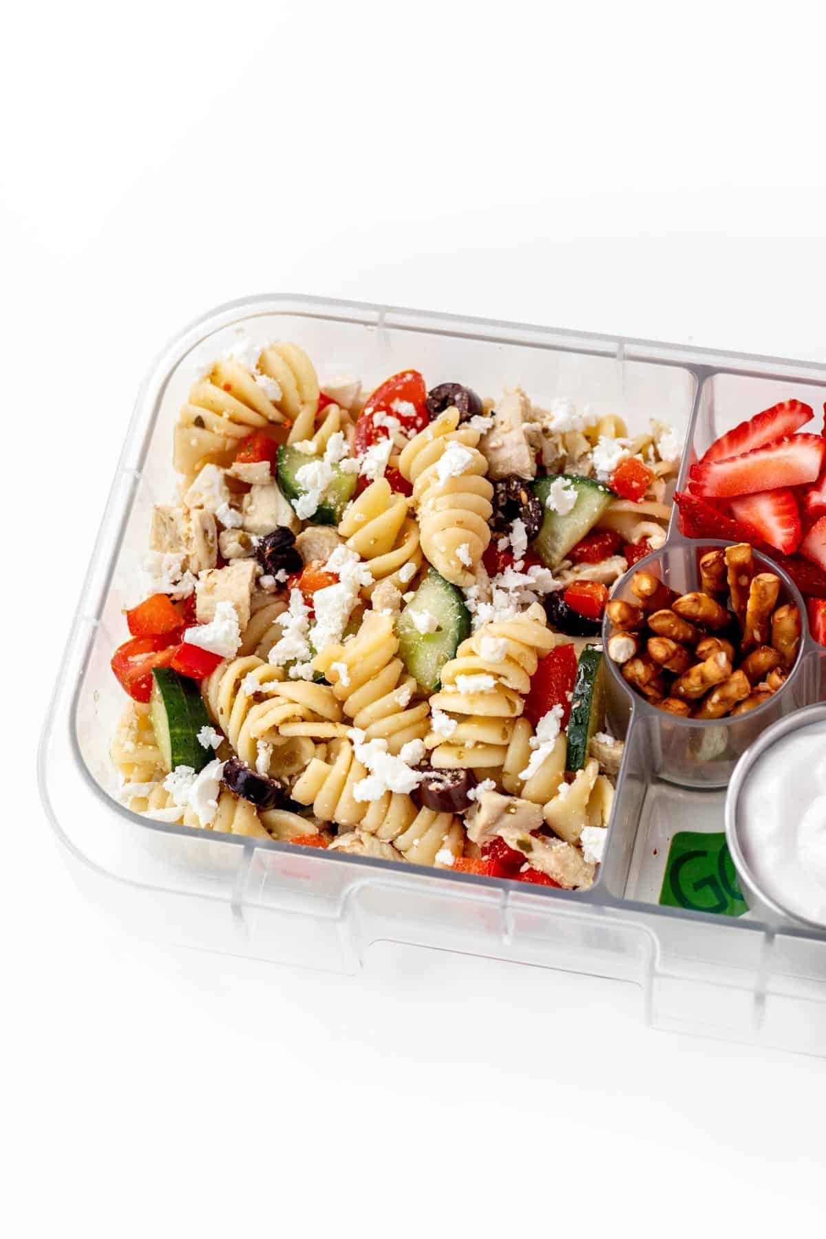 Chicken pasta salad with strawberries and yogurt.