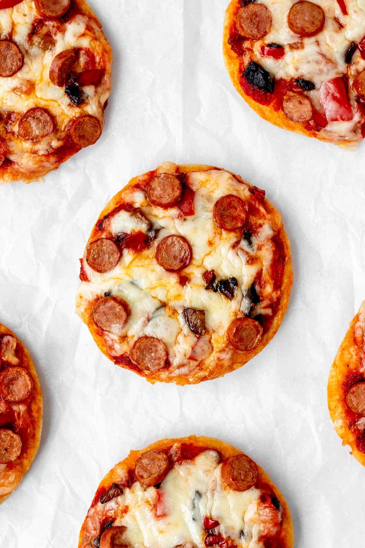 Air fryer mini pizzas with mini pepperoni and mushrooms.