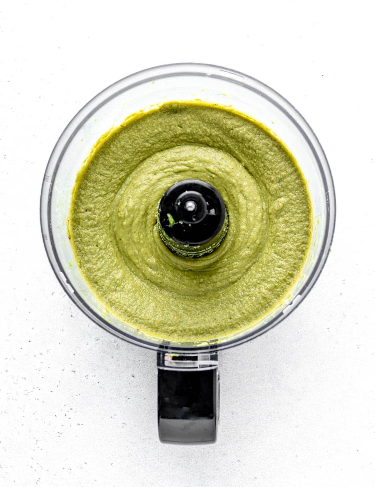 Avocados blended together in a food processor.