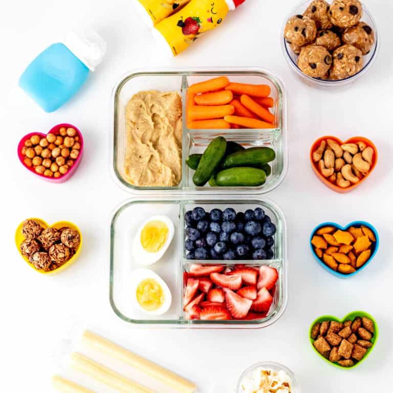 Examples of healthy road trip snacks for kids on a white background.