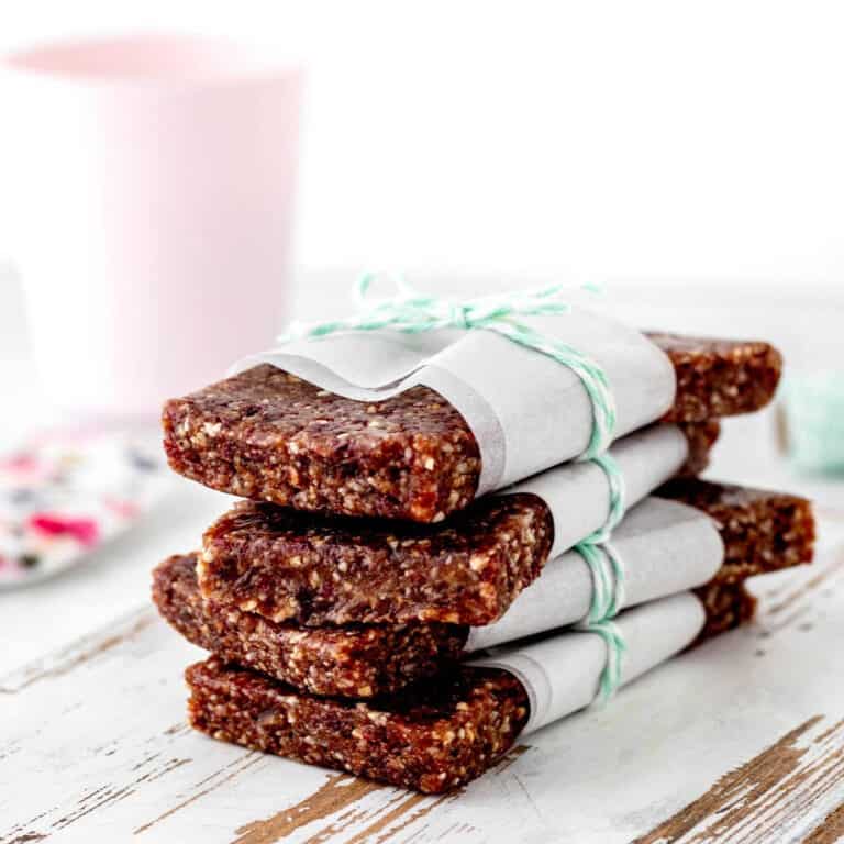 Pressed fruit bars stacked on top of each other and tied with string.