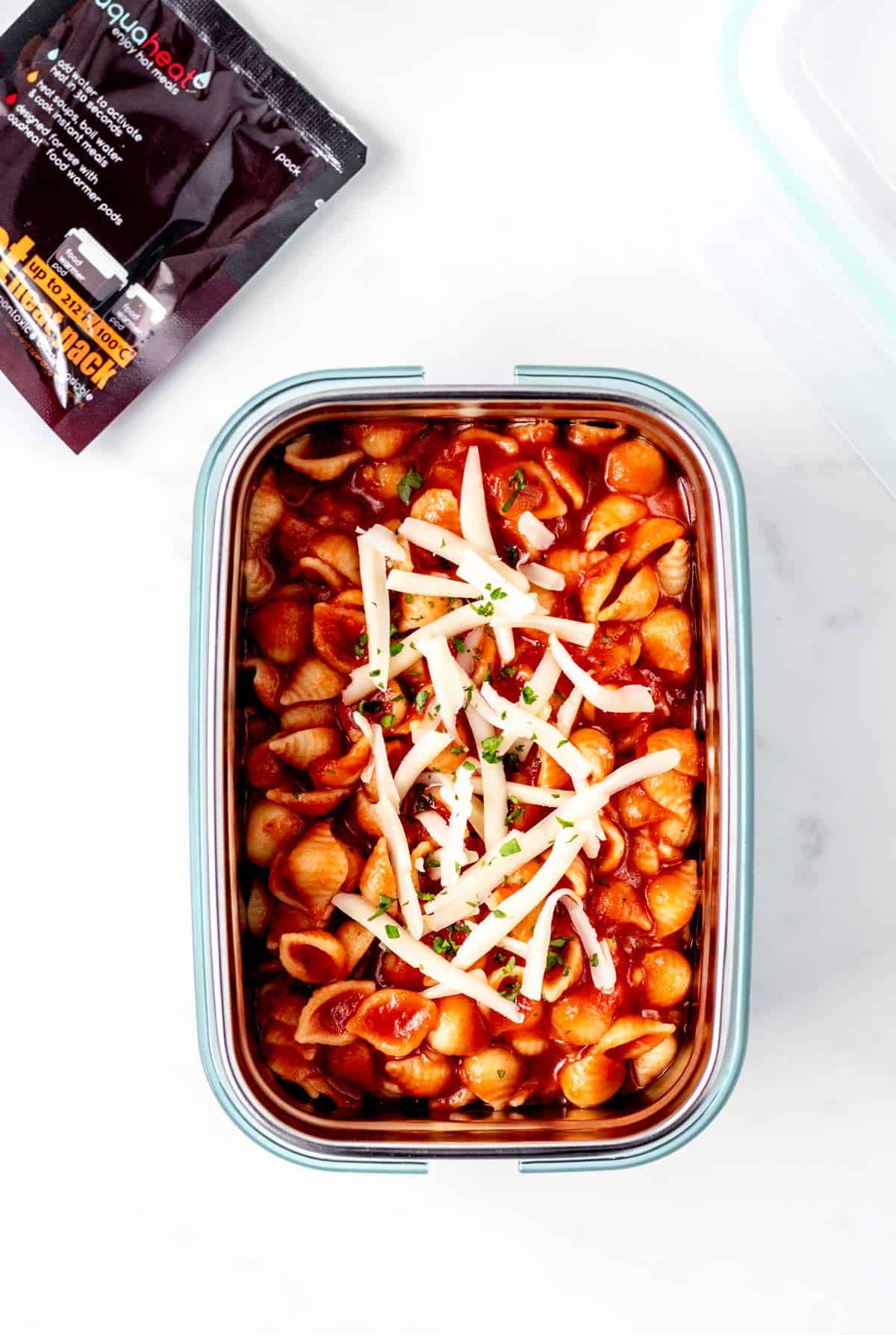 Pasta soup in a thermal container with a heat pack.