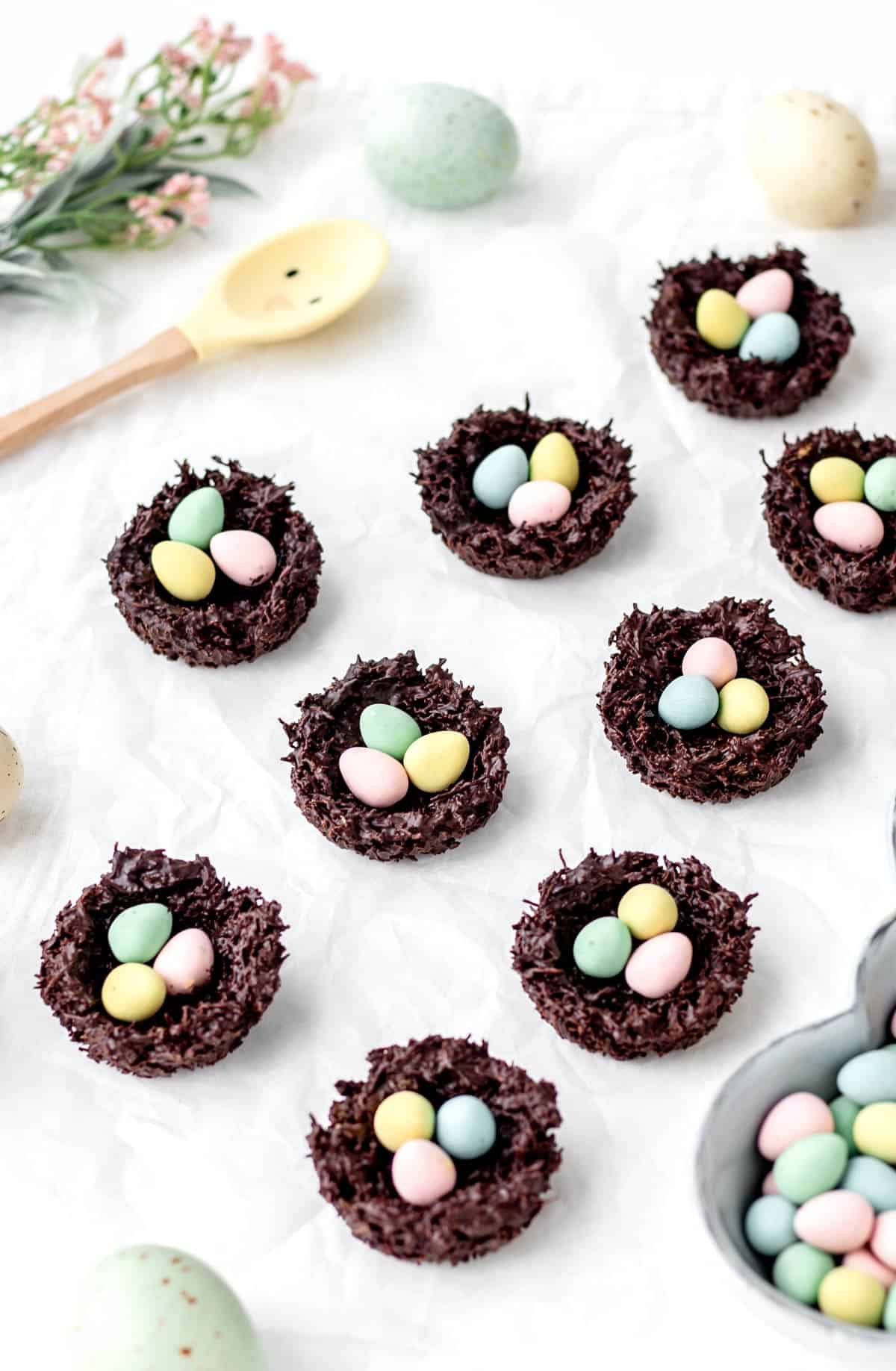 Fully assembled shredded wheat Easter bunny nests on the counter.