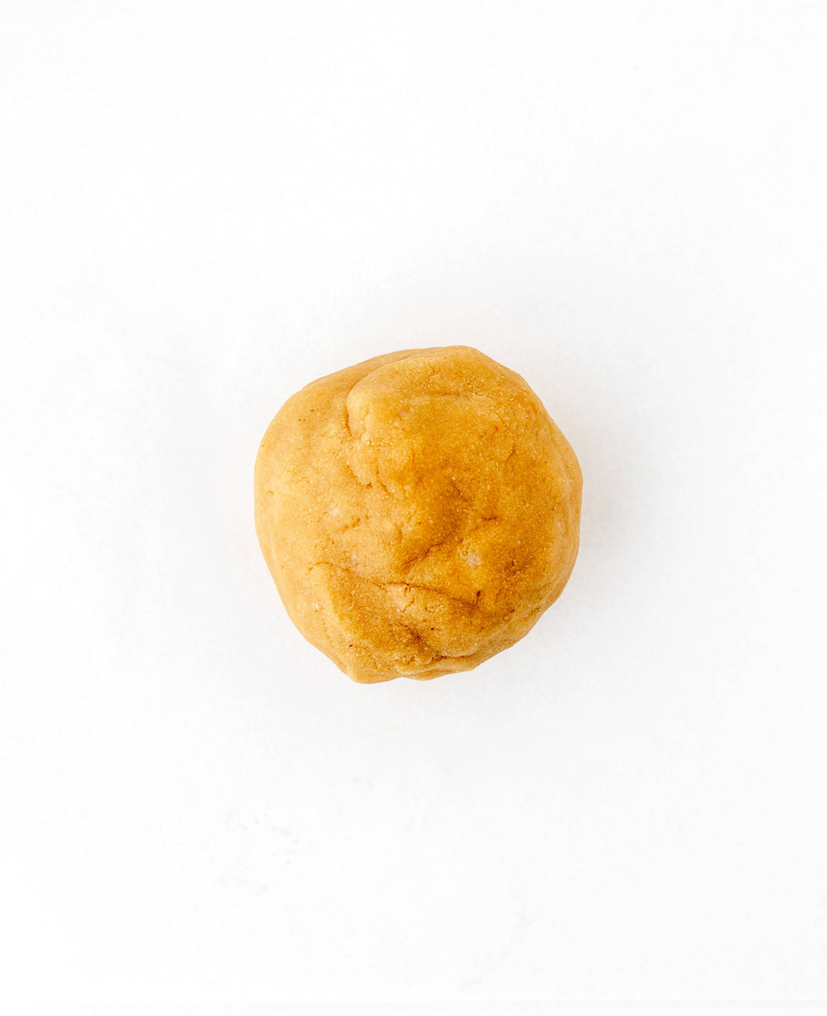 A ball of dough for the Easter egg fruit cookies.