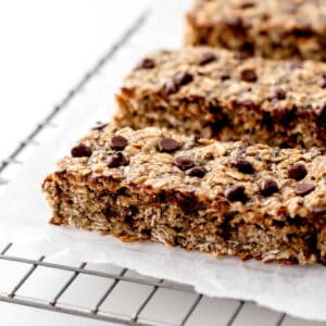 Nut free granola bars lined up on a cooling wrack.