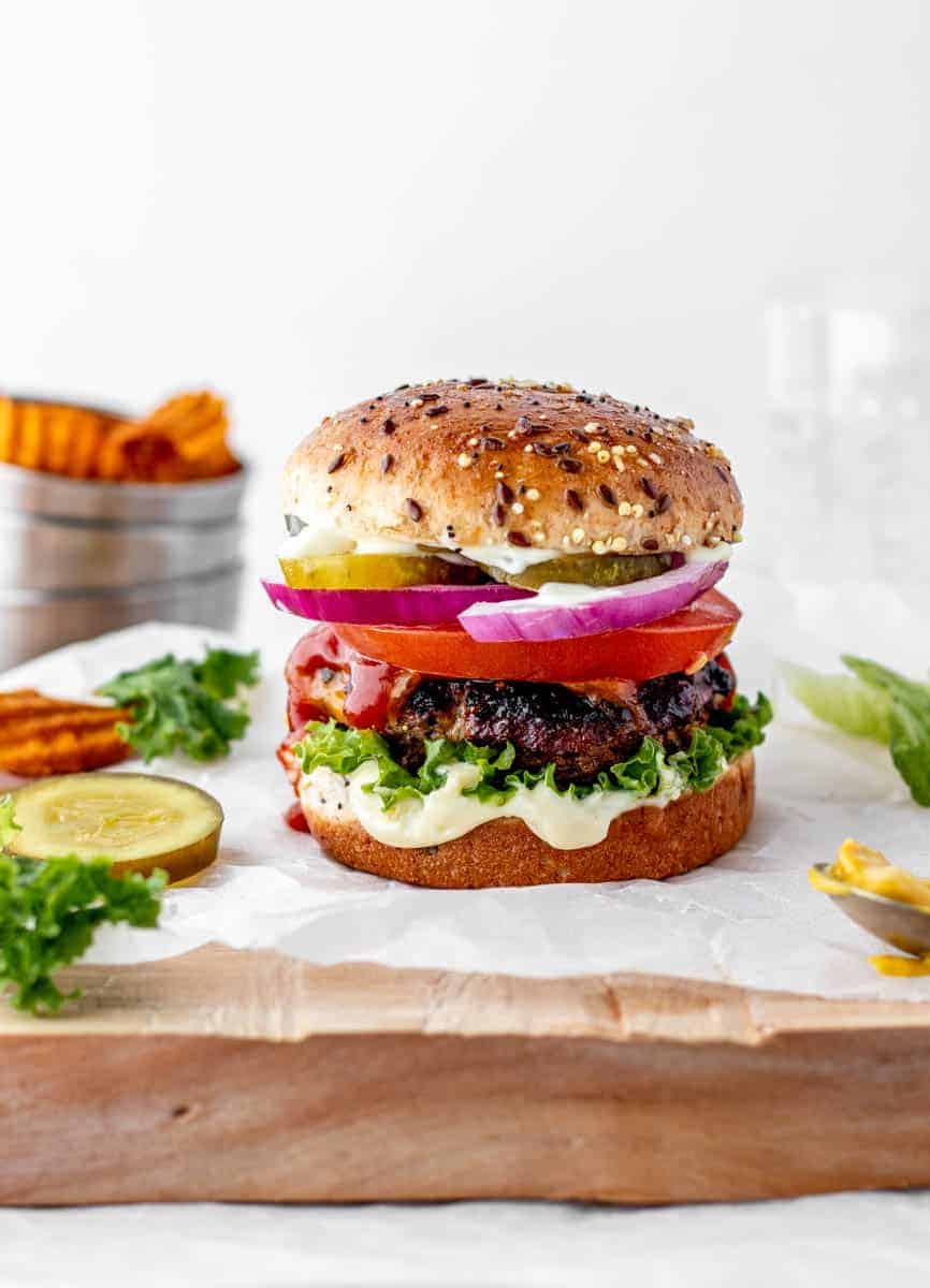 A Worcestershire burger on a piece of parchment paper.