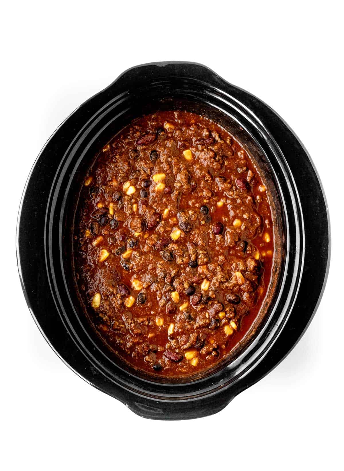 Kids chili con carne in a slow cooker.