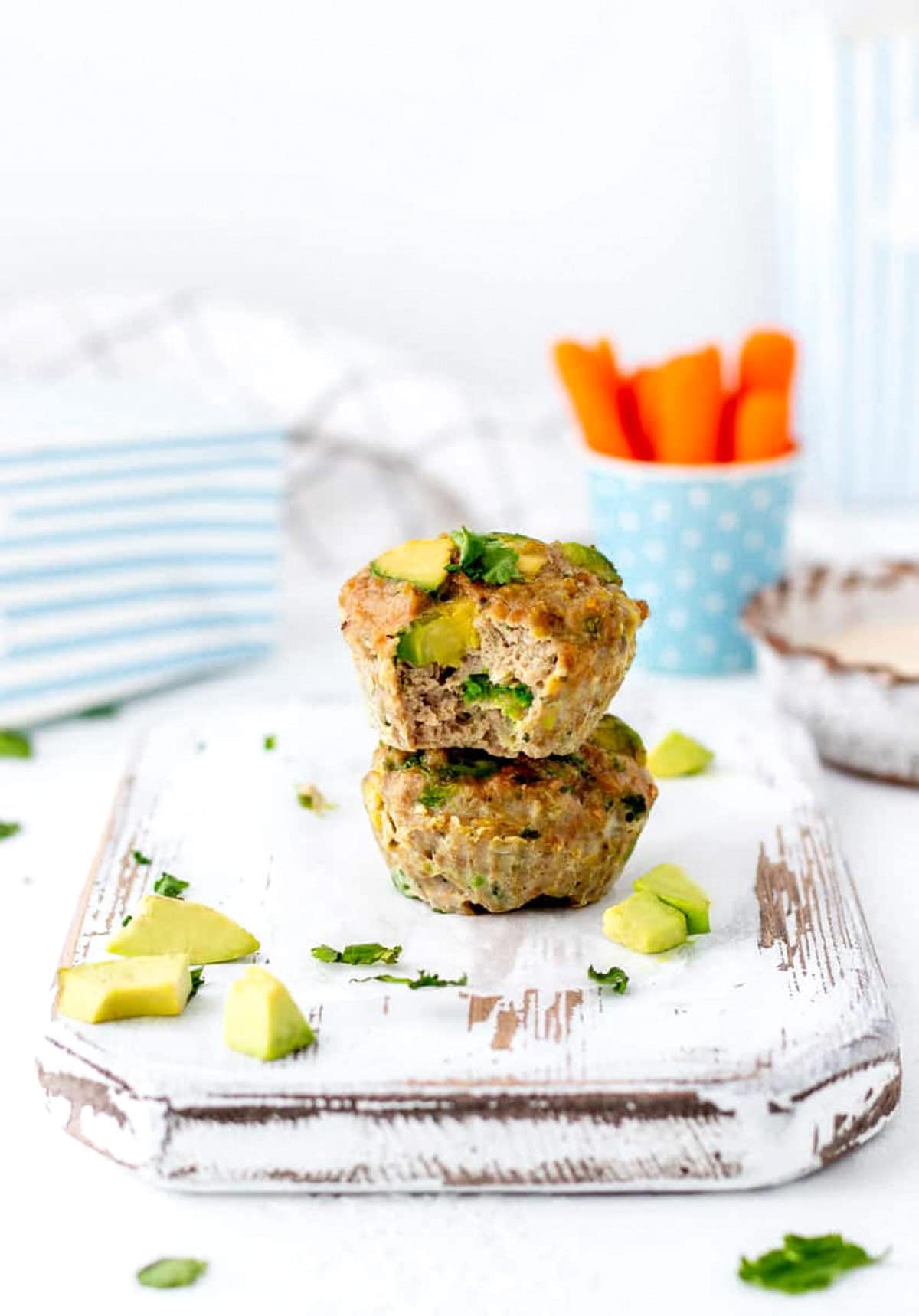 Two chicken avocado poppers stacked on top of each other.