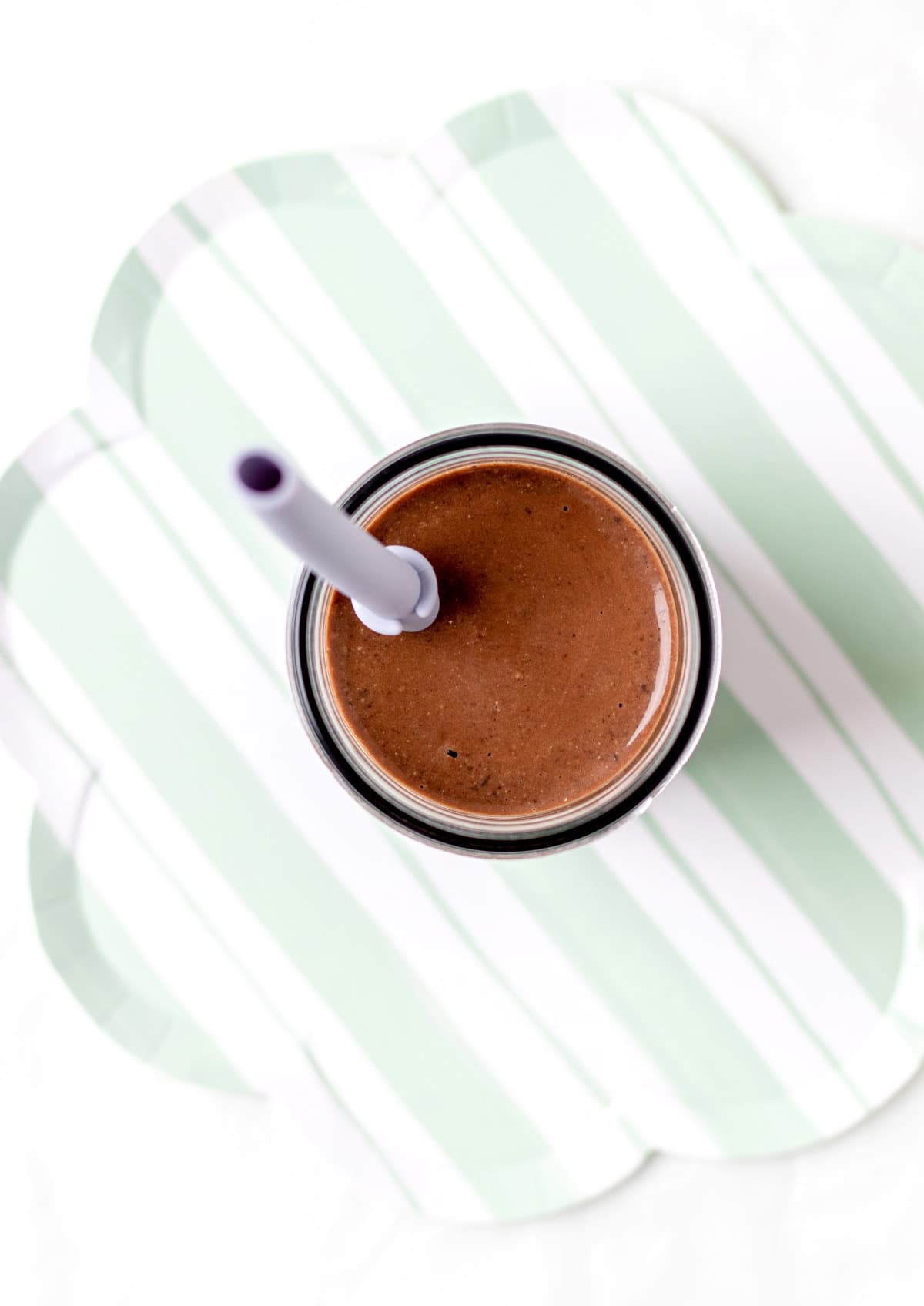 A birds-eye view of a creamy chocolate black bean smoothie.