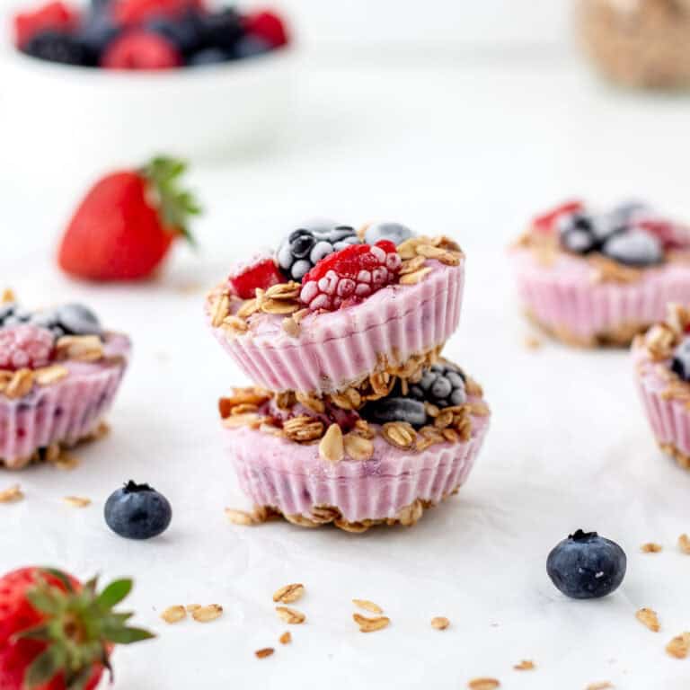 Two frozen Greek yogurt bites stacked on top of each other.