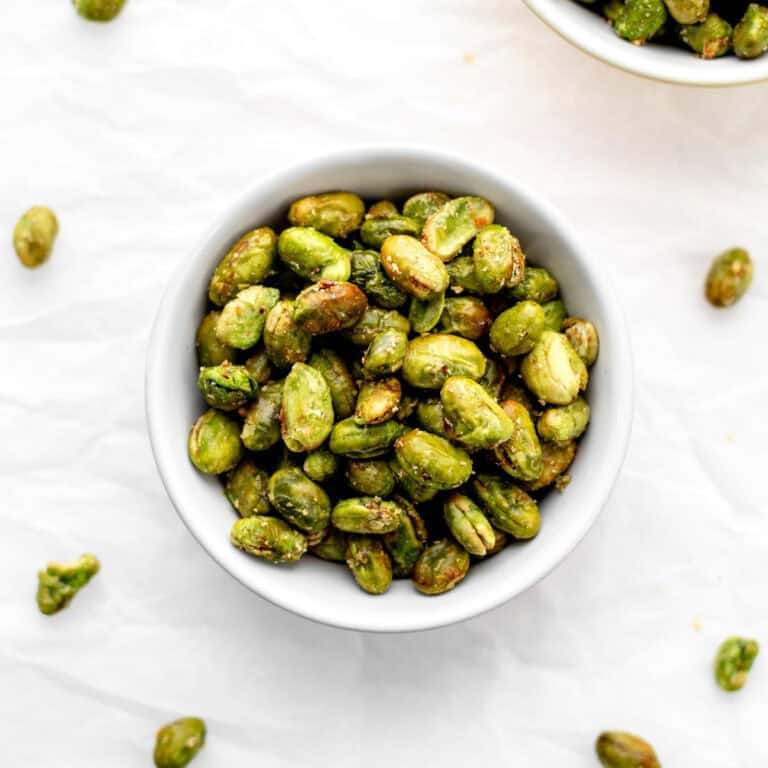 A small bowl of air fried edamame ready to serve.